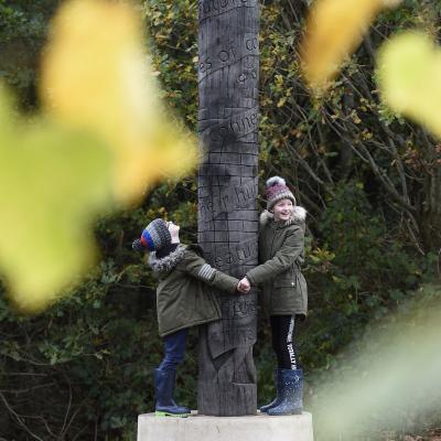 Jack and Sophie Tinman inspect the new charter pole at Friends of Belvoir Wood