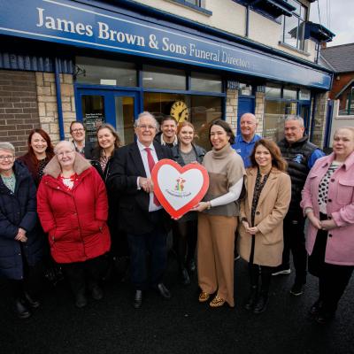 James Brown MBE and Beverley Brown, James Brown & Sons, are pictured with recipients of the James Brown & Sons Community Fund. www.jamesbrownfuneraldirectors.com