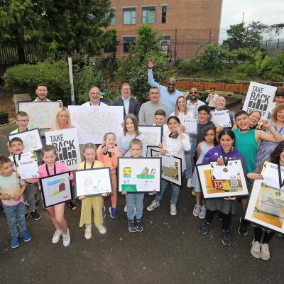 Matthew Lloyd of Matthew Lloyd Architects, winner of the £10,000 prize sponsored by the Oak Foundation, with Take Back the City campaigners who have been working with local communities to develop proposals for the Mackies site for many years. hhttps://www.takebackthecity.ie/competition