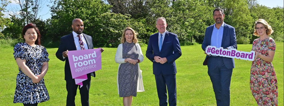 Boardroom Apprentices May Cheung (2019), Nikita Brijpaul (2020), Jo McGinley (2020) Minister of Finance Conor Murphy MLA, David Johnston (2021) and Roisin Kelly (2019) encouraging people to #GetOnBoard by applying for the Boardroom Apprentice programme before applications close on May 24th.  Photo by Colm Lenaghan at Pacemaker Press.