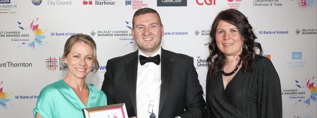Amanda Castray of Ulster University is pictured congratulating the team from Musgrave Northern Ireland on winning Belfast Chamber Awards Contribution to the Community Award. www.belfastchamber.com
