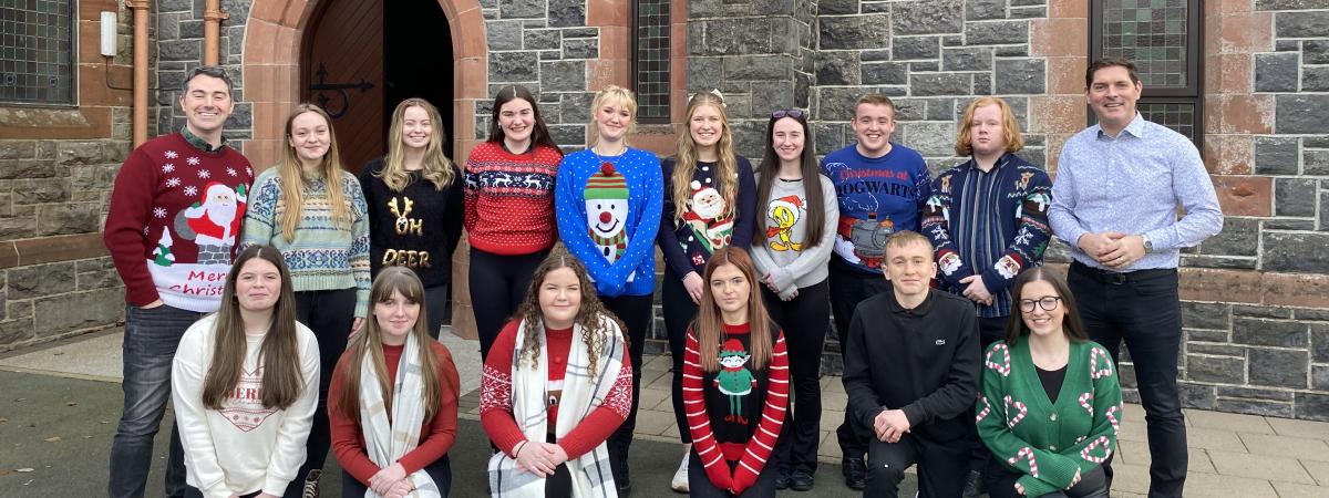 Malachi Cush is pictured with the Omagh Community Youth Choir https://www.malachicush.com/