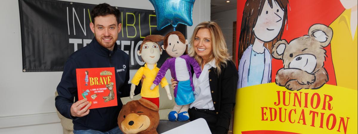 Pictured from left to right: Barry Rogan from Power NI and Gayle Bunting, CEO of Invisible Traffick