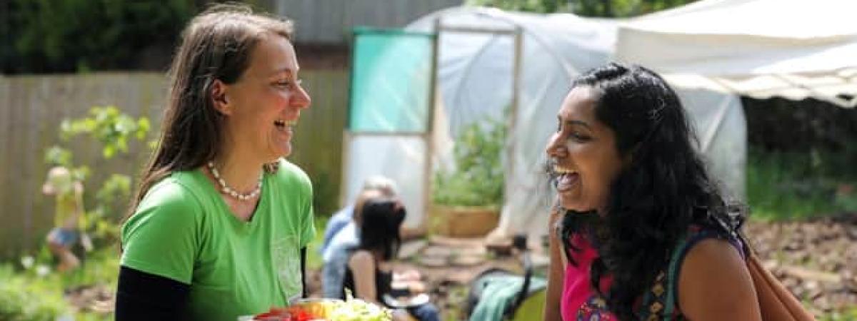 Two people eating lunch and looking happy