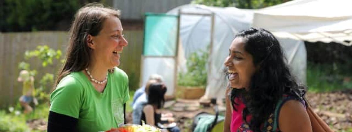 People sharing food and laughing