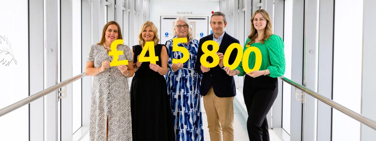 Record amount raised by A&O Shearman Belfast colleagues for Friends of the Cancer Centre. (L-R) Carol Stewart, Pauline Wylie and Simon Wagstaff from A&O Shearman Belfast, join Ana Wilkinson (centre) and Ciara Bainbridge (far right) from Friends of the Cancer Centre to celebrate the successful two-year partnership which raised £45,800 for the charity.  