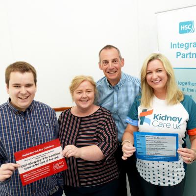 Organ donation champion Jo-Anne Dobson and her son, Mark, who underwent a recent kidney transplant, promote a new 'sick day' card to help people keep their kidneys healthy. Included with them are Dr John Harty, from Southern Trust's renal unit and Michele Bekmez, Southern area Integrated Care Partnership.