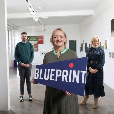 Arts & Business NI team members gather in Golden Thread Gallery to celebrate the launch of Blueprint