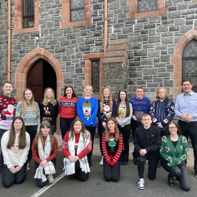 Malachi Cush is pictured with the Omagh Community Youth Choir https://www.malachicush.com/