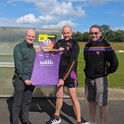 Wibble Web Design Belfast proudly announces sponsorship of Carryduff GAC - presnetation photo