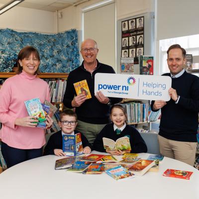 Pictured (L-R) is Gwyneth Compston of Power NI, Colin Devine and Max Burns of Strandtown Primary, and pupils of Strandtown Primary School.